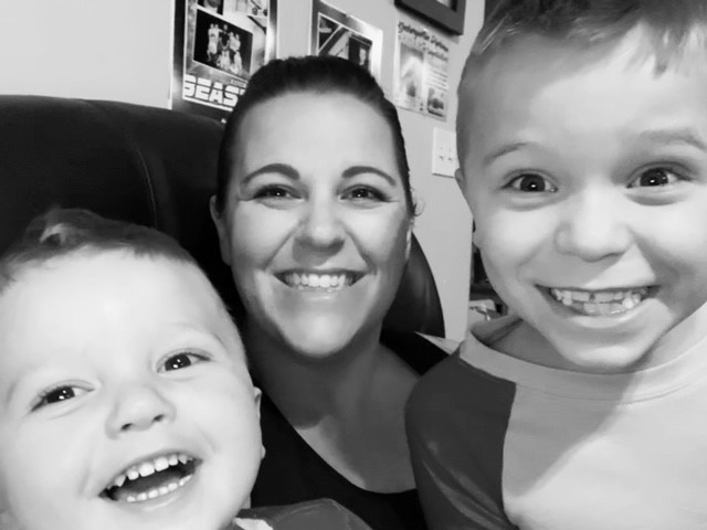 stephanie holt and her two sons smiling for the camera