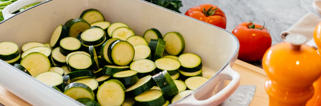 sliced zucchini in a baking dish